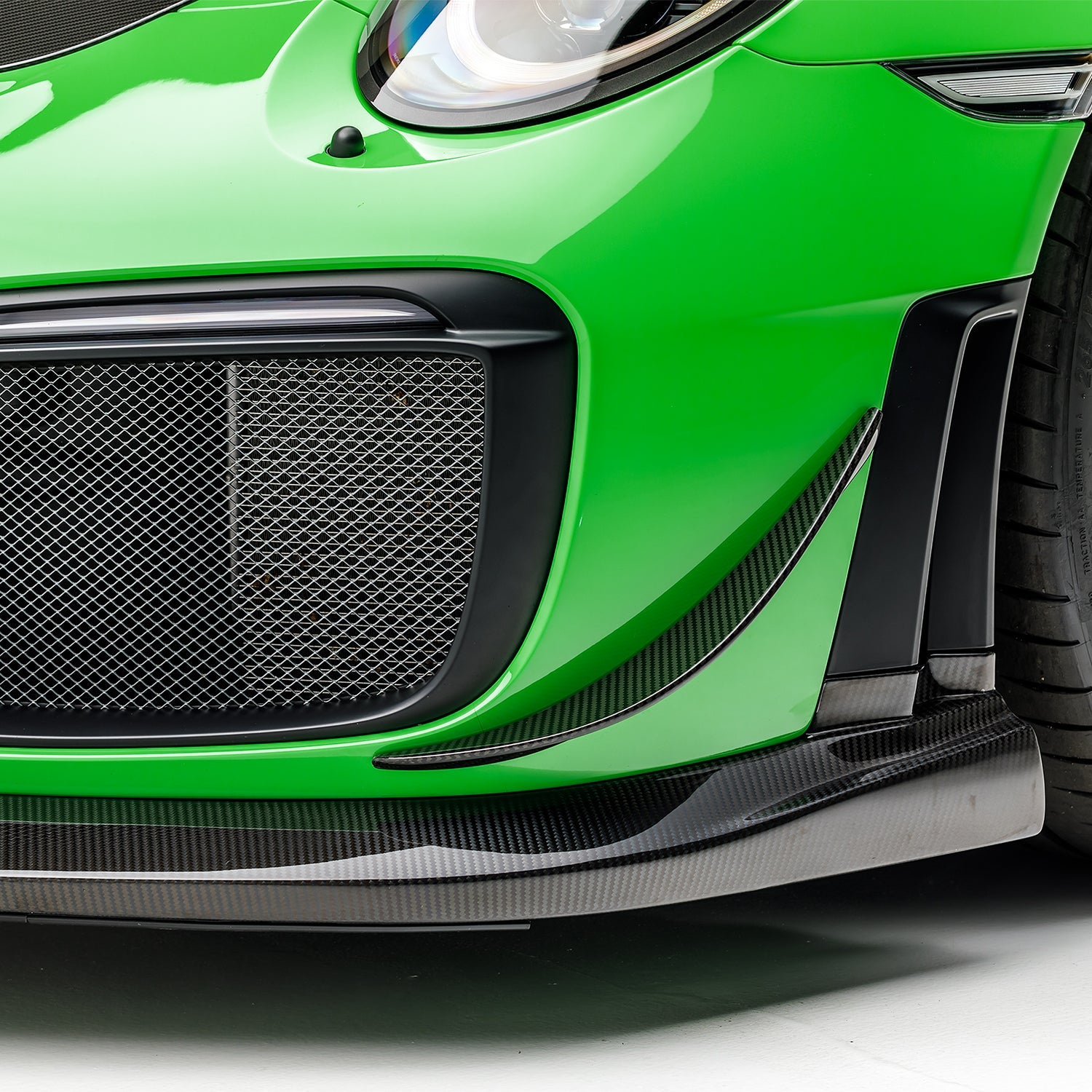 Carbon EVO front spoiler under GT2 RS intake, close-up