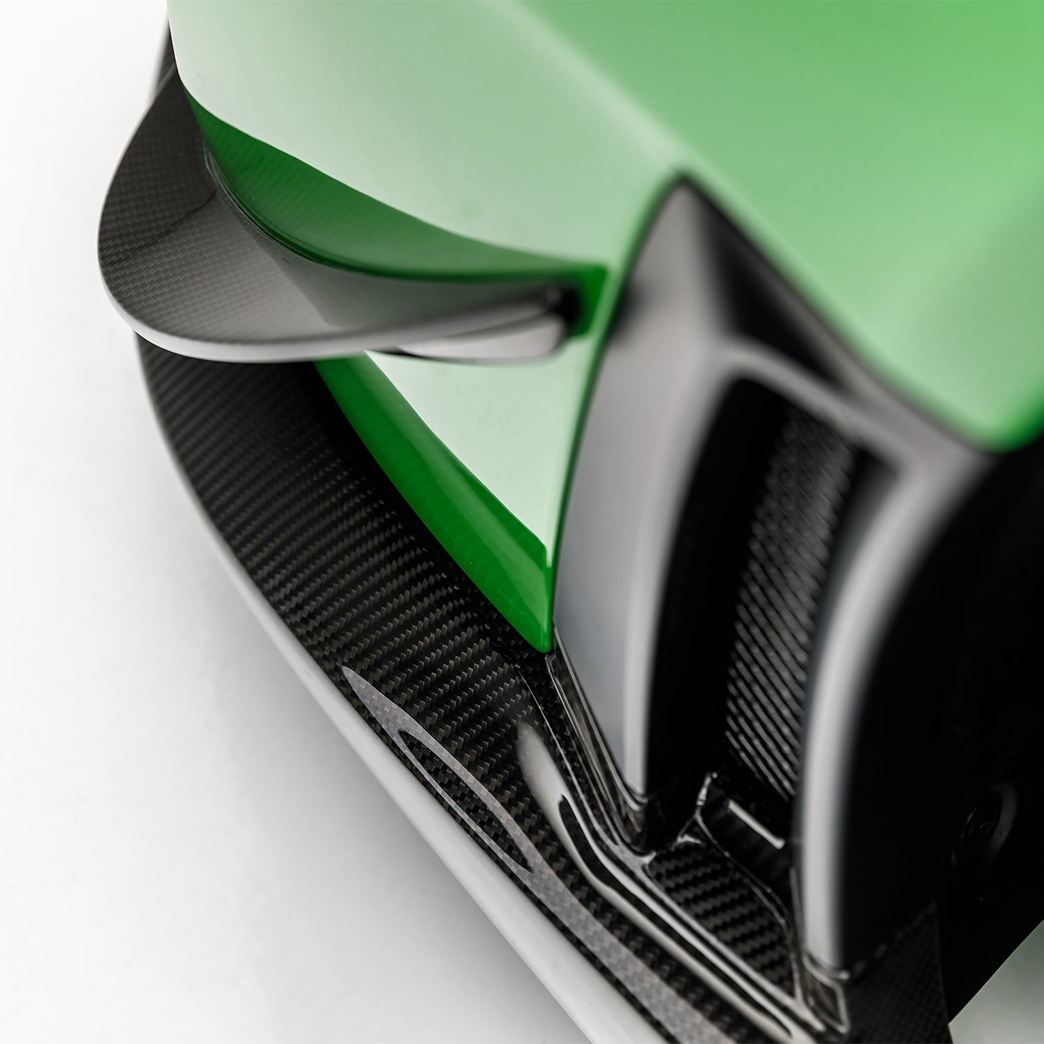 Carbon front spoiler end on GT2 RS bumper corner, macro detail