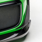 Carbon canard edge beside GT2 RS intake mesh, macro detail