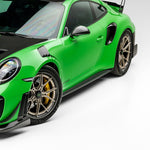 Carbon side skirt on green Porsche 991.2 GT2 RS, front 3/4 view