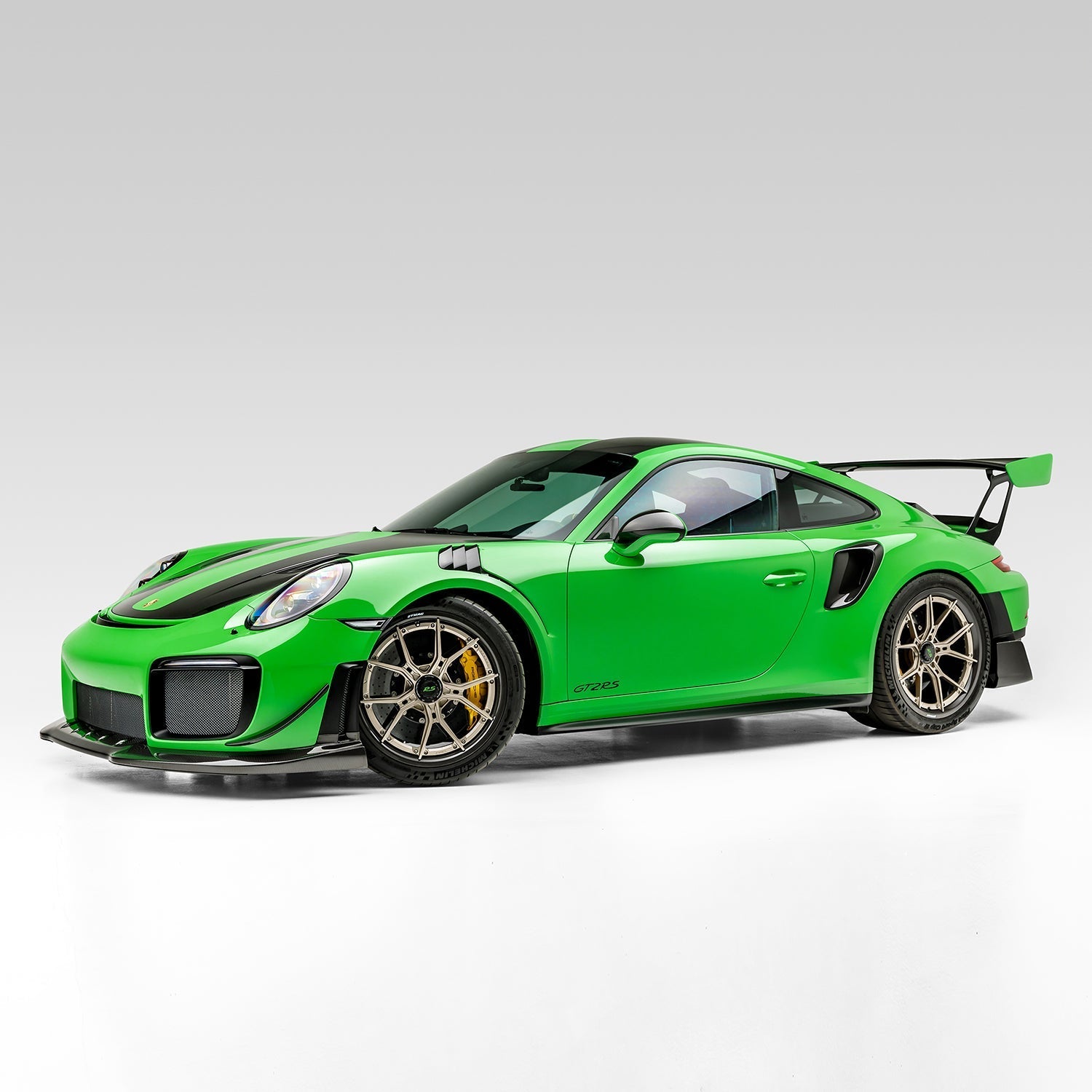 Green GT2 RS with Vorsteiner side skirts, front 3/4 view of car