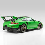 Green GT2 RS with side skirts, rear 3/4 view of car