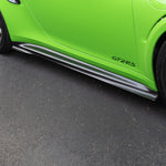 Carbon side skirt under GT2 RS door badge, low side view