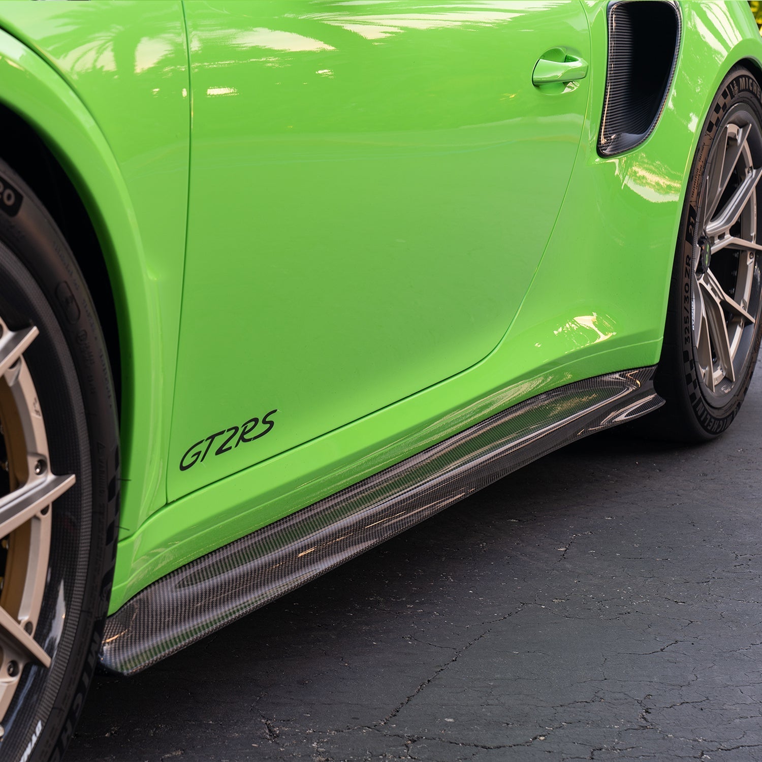 GT2 RS side skirt between wheels, angled outdoor close-up
