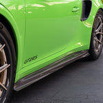 GT2 RS side skirt between wheels, angled outdoor close-up