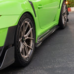 Side skirt front end behind GT2 RS front wheel, outdoor detail