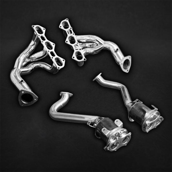 Wide top view of Capristo Set: Header Manifolds and 250 Cell Sport Cats for Porsche 718 Spyder / GTS / Cayman GT4 2017+ with black background
