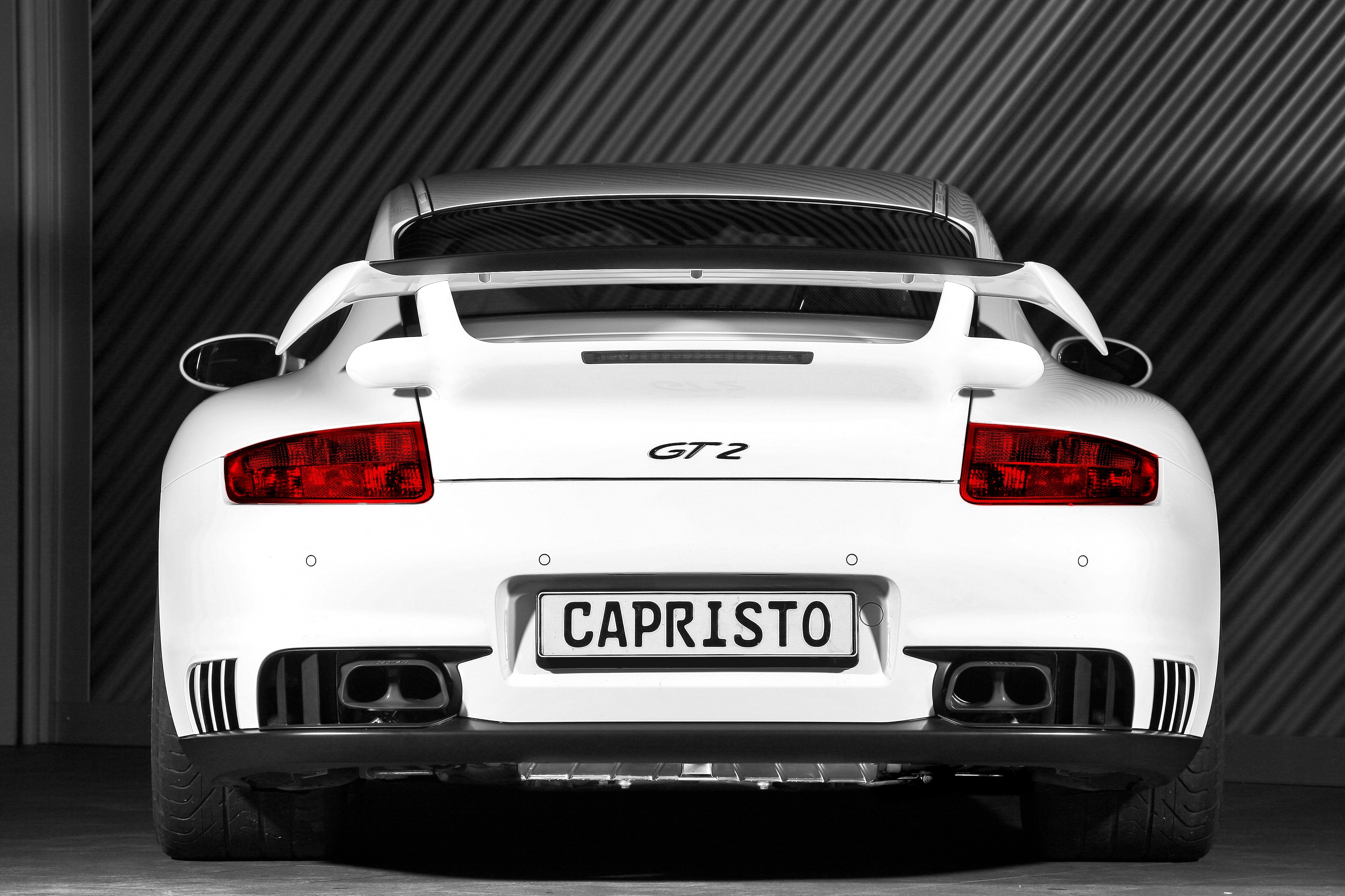 White Porsche 997 GT2 rear view with Capristo exhaust and twin tips each side