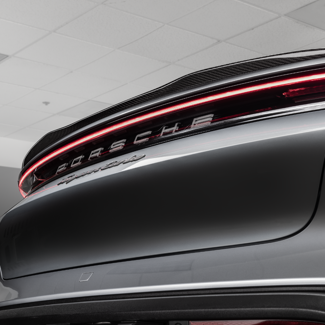 Taycan decklid spoiler above light bar, angled close-up