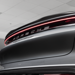 Taycan decklid spoiler above light bar, angled close-up