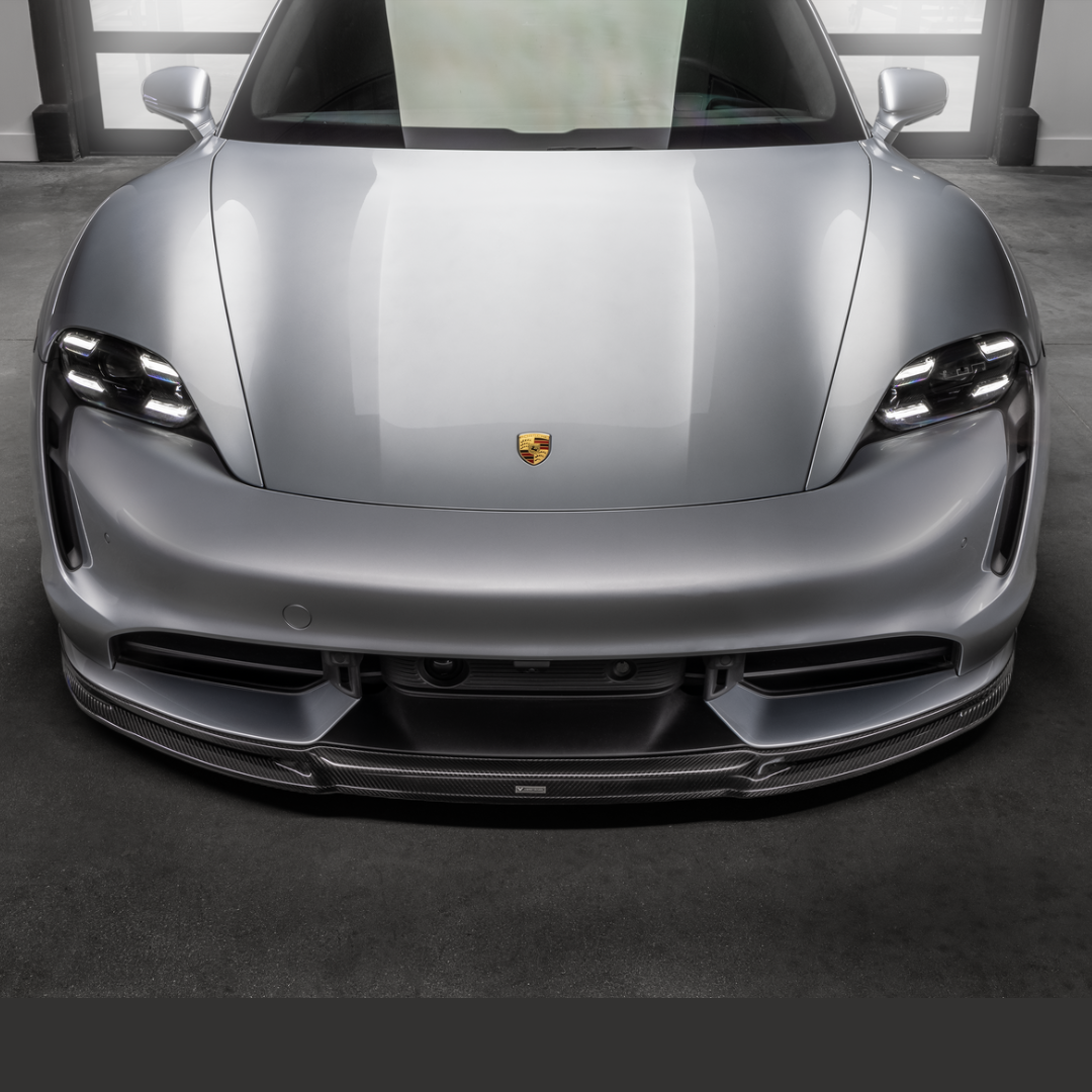 Silver Taycan with GW9 front spoiler, head-on garage view