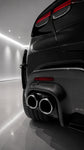 Capristo carbon rear diffuser around twin tailpipes on Ferrari Purosangue