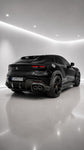 Black Ferrari Purosangue rear three-quarter view with Capristo carbon side skirts and arches