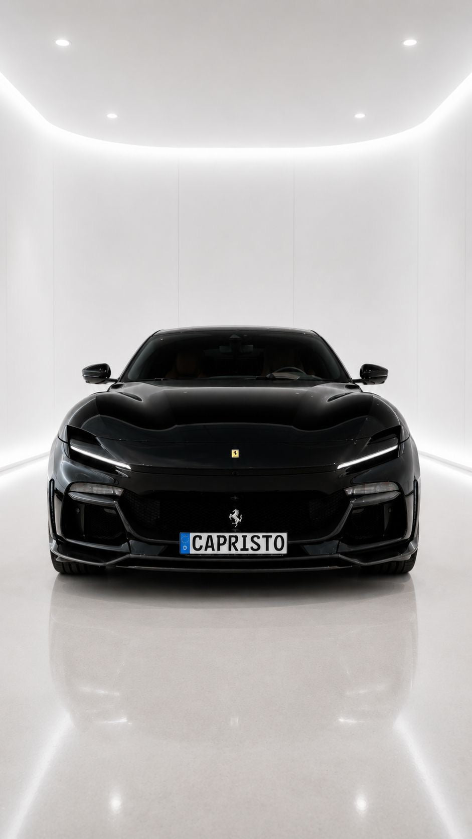 Black Ferrari Purosangue head-on with Capristo carbon front spoiler