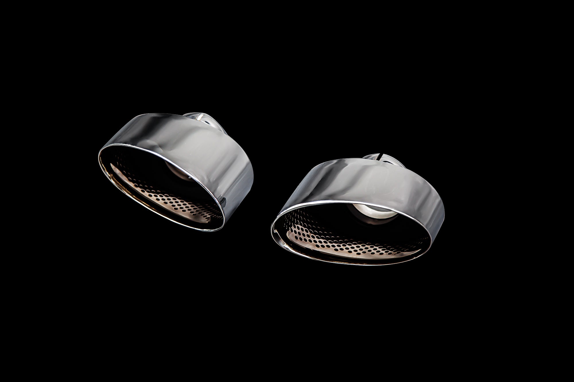 A front view of chrome silver tips of the IPE SS Cat-Back Exhaust System for Audi RS3 8V.2 Sportback / Sedan 2017-2021 with black background