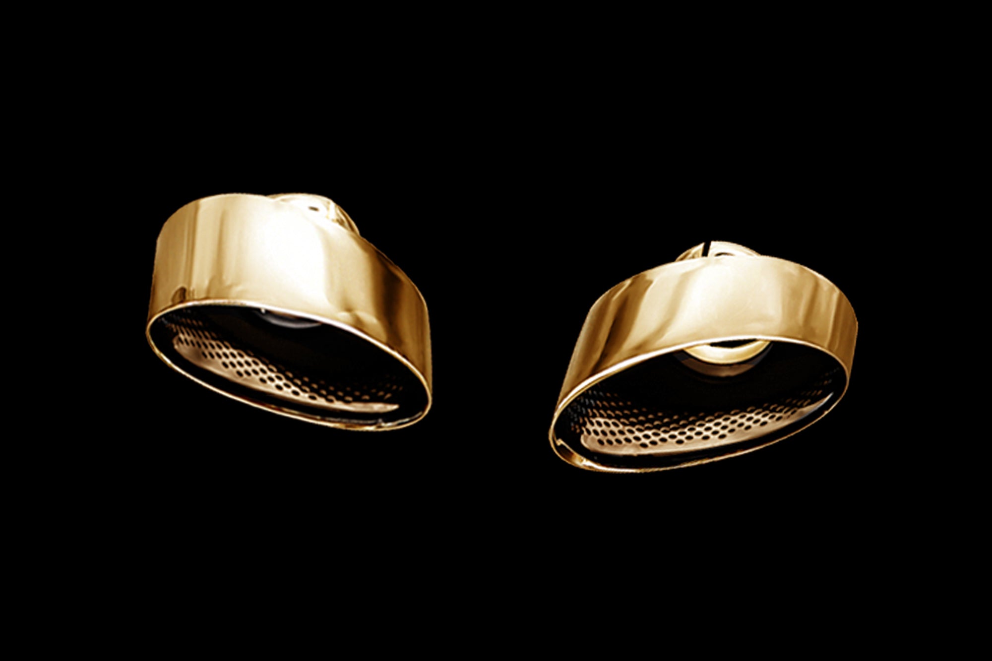 A front view of gold tips of the IPE SS Cat-Back Exhaust System for Audi RS3 8V.2 Sportback / Sedan 2017-2021 with black background