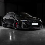 Black Audi RS6 Avant C8 with the Urban carbon fiber front splitter, front three-quarter view