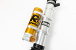 Gold reservoir on the RennTech G-Class shock close up - Performance Shocks for the 1990-2018 G-Class