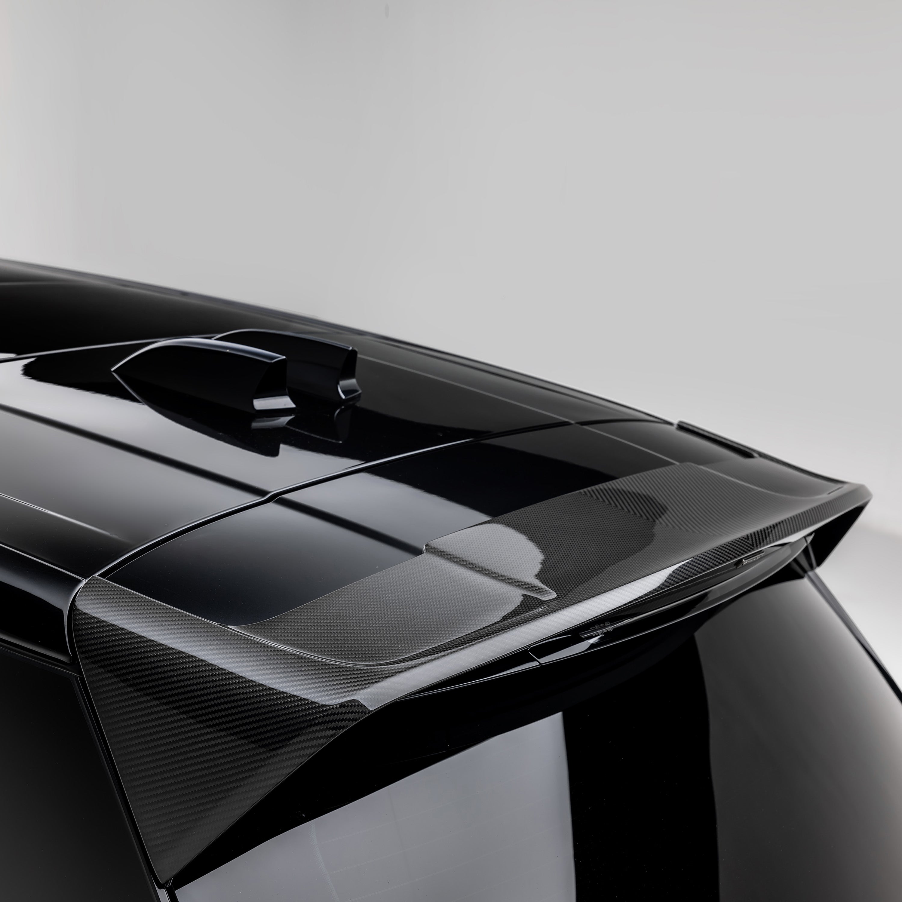 L460 carbon roof spoiler from above, top-down view