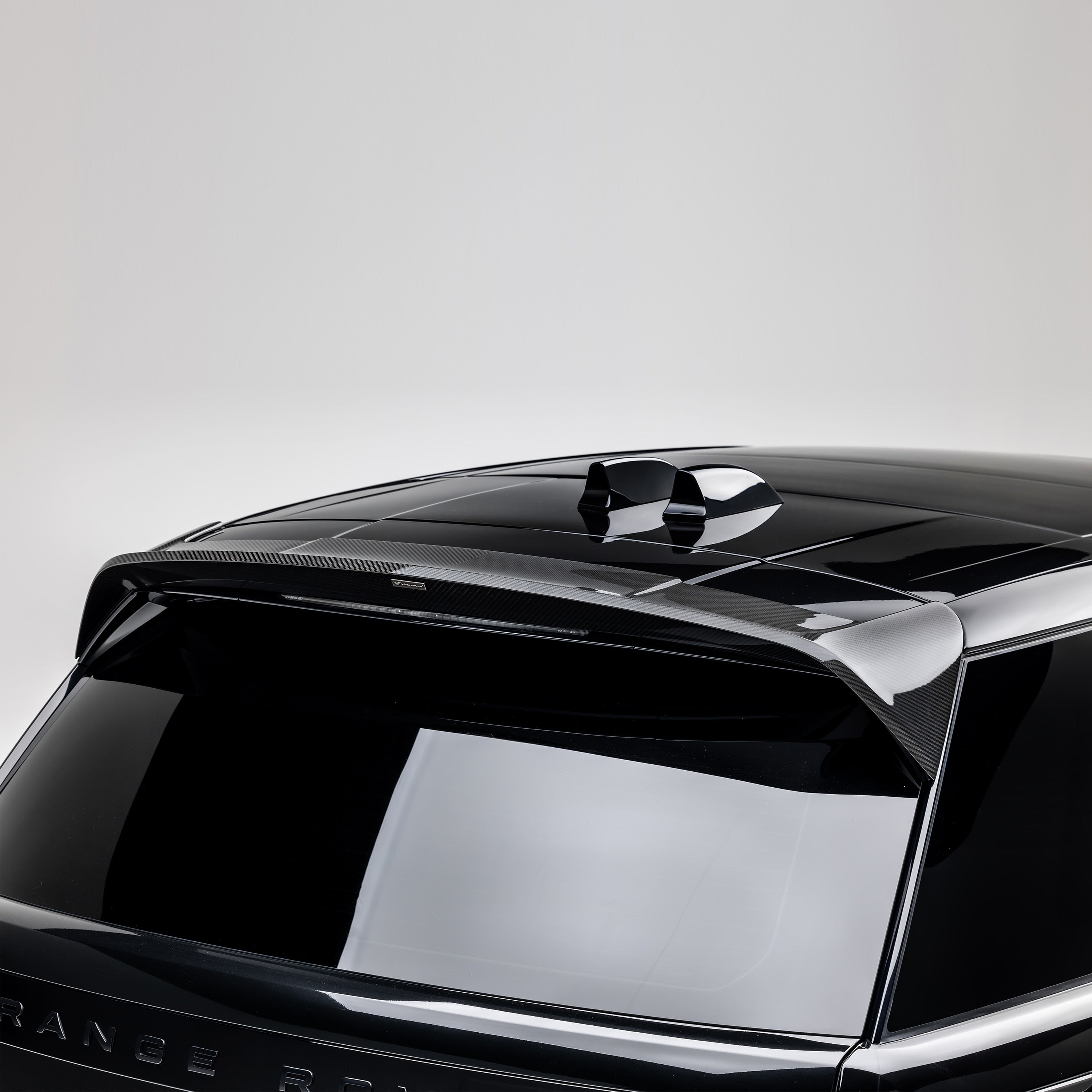 Range Rover L460 roof spoiler over rear glass, straight rear view