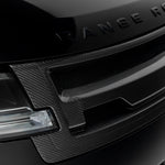 L460 carbon upper grille below Range Rover script, close-up