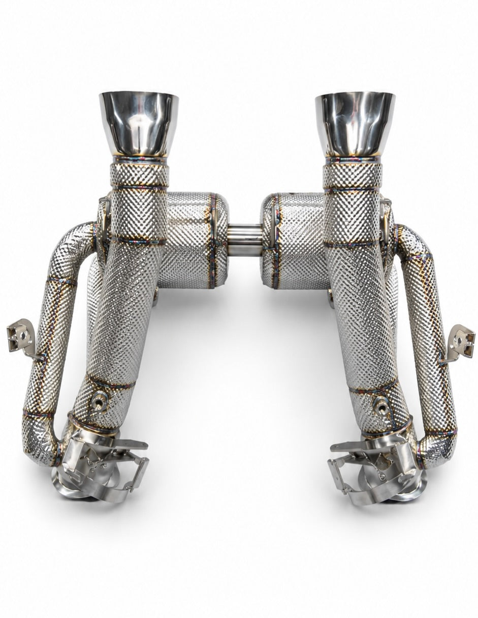 Underside of the Revuelto valved exhaust showing inlet pipes and valve actuator mounts