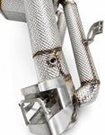Detail of heat-wrapped inlet pipe and valve actuator bracket on the Revuelto exhaust