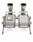 Revuelto exhaust from above showing Capristo and REVUELTO name brackets over the mufflers