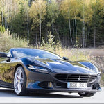 wide side view of Capristo Carbon Fiber Front Bumper (Complete) for Ferrari Roma 2020–2024 fitted inside a car