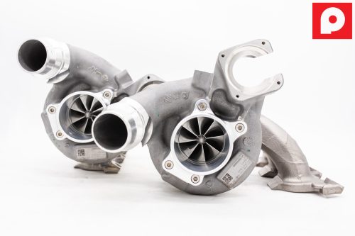 A front view of Pure Turbos BMW S58 STG2+ Upgrade Turbos with a white background