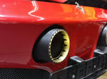 close view of Capristo Carbon Exhaust Tips for Ferrari SF90 2019–2025 fitted inside a car