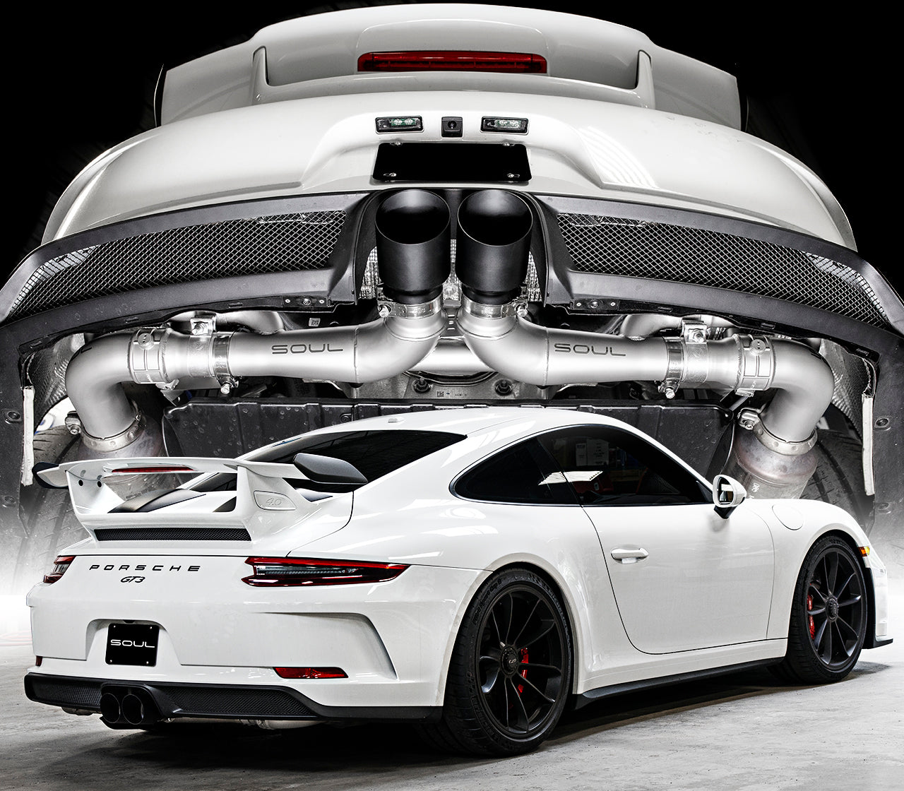 991 GT3 / GT3 RS center muffler bypass exhaust: exhaust installed, view from below a white GT3