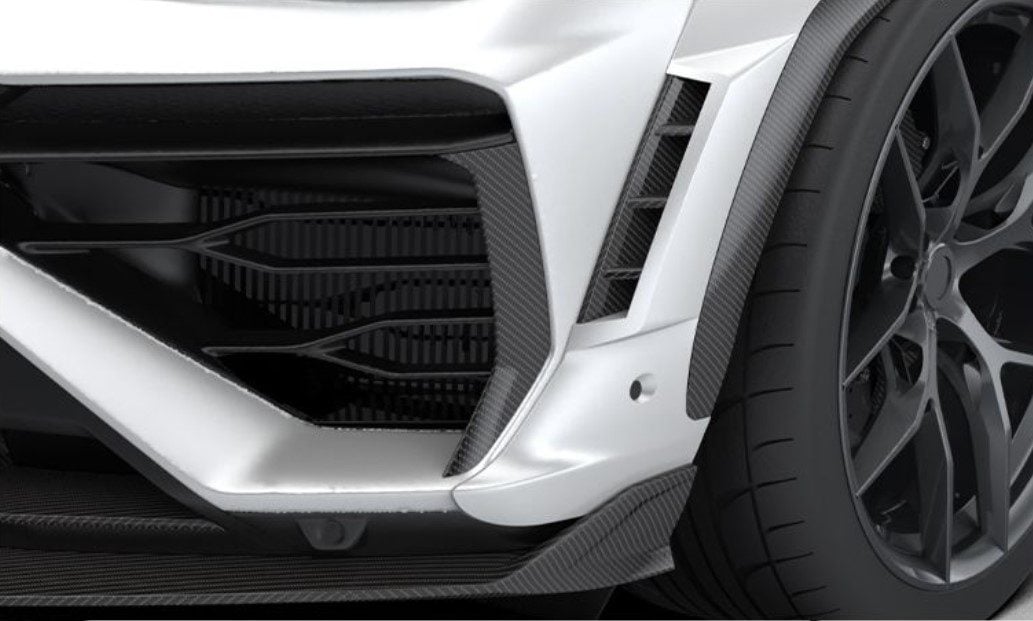 Carbon front bumper upright on a white Lamborghini Urus SE, close-up