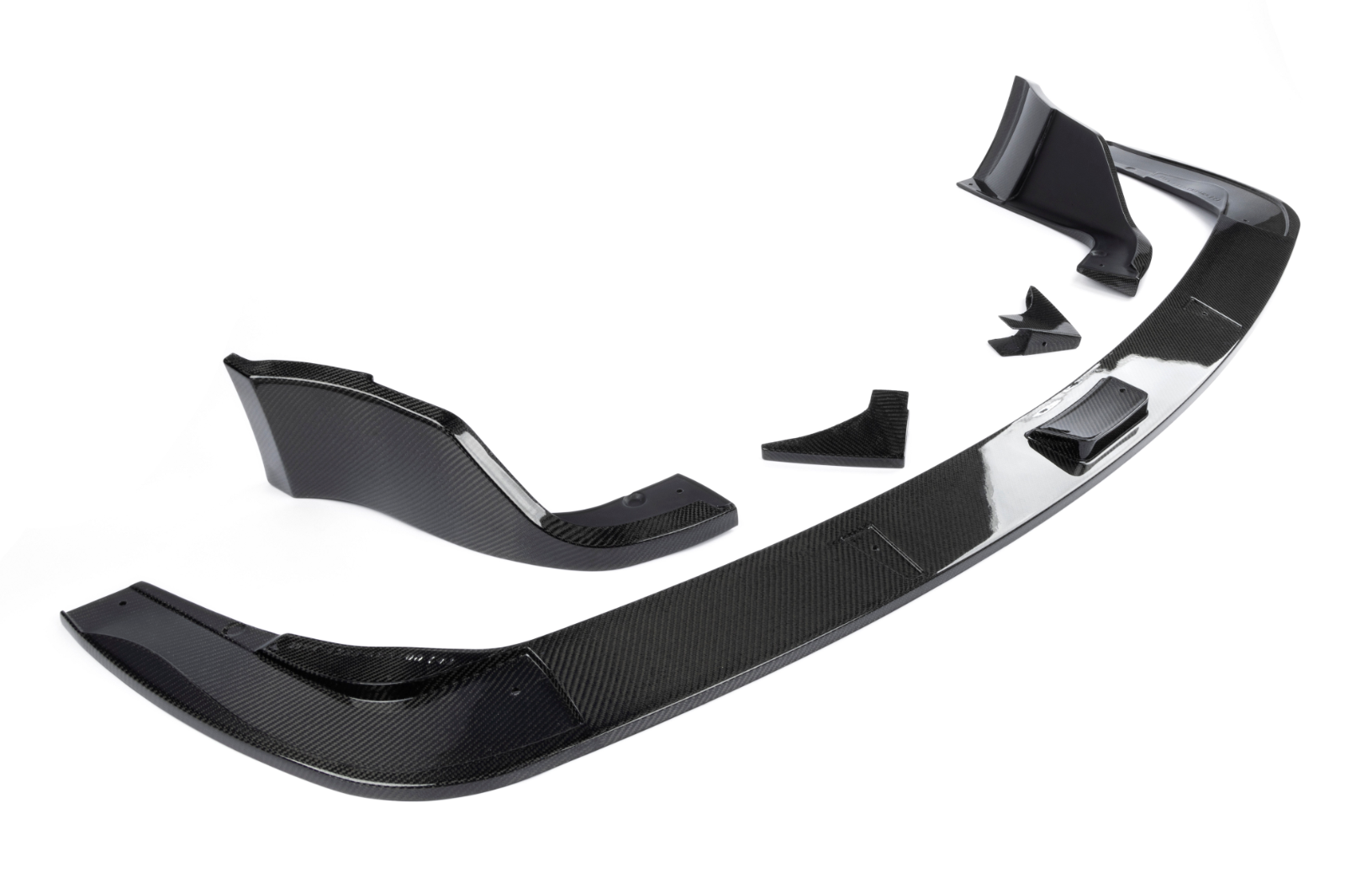 A top side wide view of Dinan Rear Diffuser for Toyota GR Supra 2020-2025 with all its parts with a white background