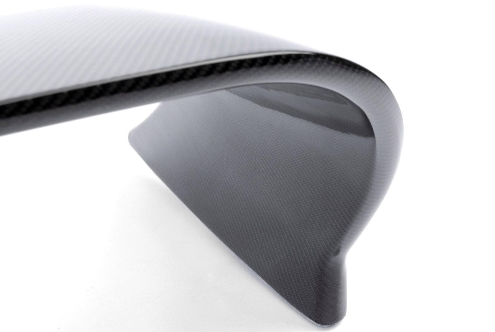 A close up view of Dinan High-Rise Rear Spoiler for Toyota GR Supra 2020-2025 with white background