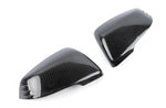 A top view of Dinan Mirror Cover Set for Toyota GR Supra 2020-2025 with white background