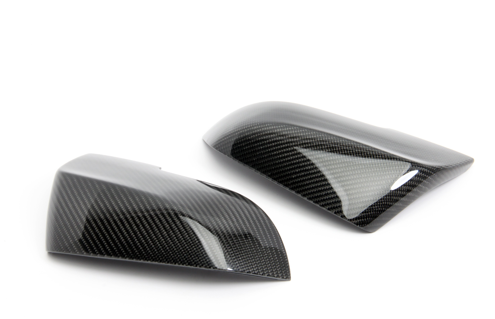 A top view of Dinan Mirror Cap Set for BMW with white background