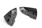 A back view of Dinan Mirror Cap Set for BMW with white background