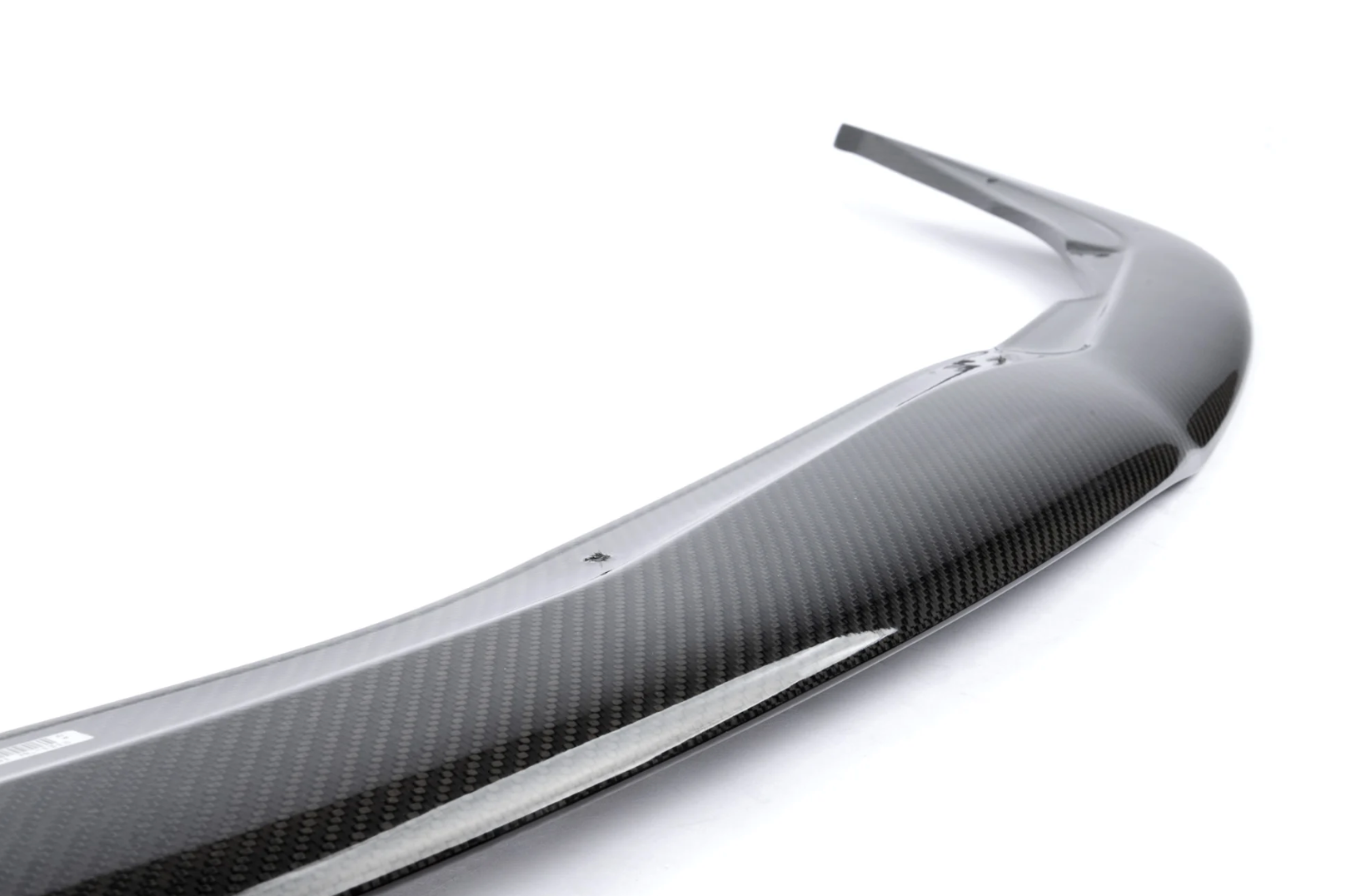 A close up view of Dinan Front Lip for Toyota GR Supra 2020-2025 with white background