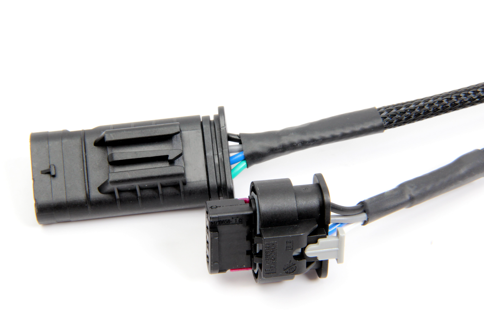 A top close up view of DINANTRONICS Sport Performance Tuner for BMW 328d / 335d / X5 2009-2018 with white background