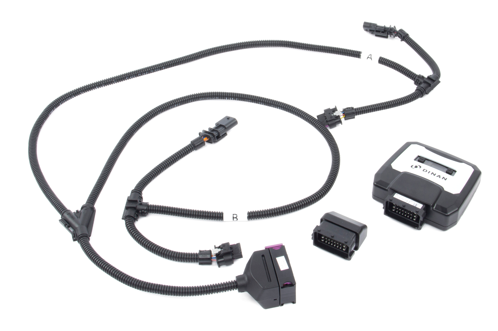 A top view of DINANTRONICS X Performance Tuner wires on a white background