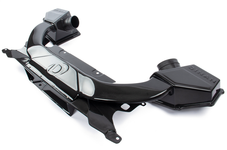 A top view of Dinan Cold Air Intake for BMW M5 2018-2023 with white background