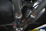 A close up view of Stillen Cat-Back Exhaust System for Hyundai Genesis Coupe [BK38] 2010-2016 fitted in a car from inside.