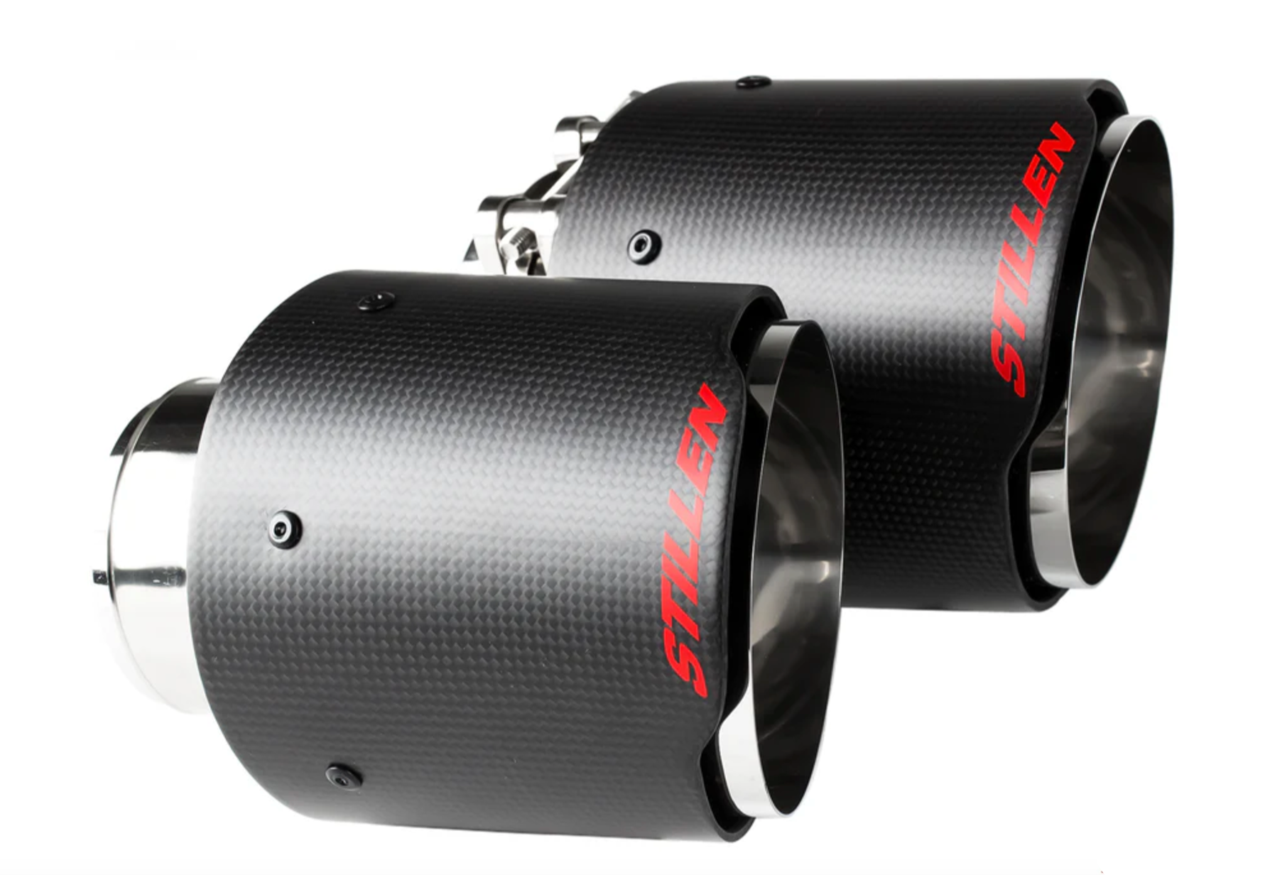 A close up view of the tips of the Stillen Cat-Back Exhaust System w/ Carbon Fiber Tips for Infiniti Q50 [3.0t] 2016-2024 with a white background