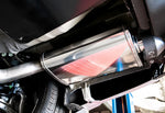 A close up view of the muffler of Stillen Axle-Back Exhaust System for Nissan Maxima [3.5L] 2019-2023 fitted inside a car