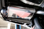 A close up view of the muffler of the Stillen Cat-Back Exhaust System for Nissan Maxima [3.5L] 2019-2023 fitted inside a car