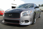 A front wide view of Stillen 7-Piece Body Kit for Nissan Maxima 2009-2015 fitted on a grey car