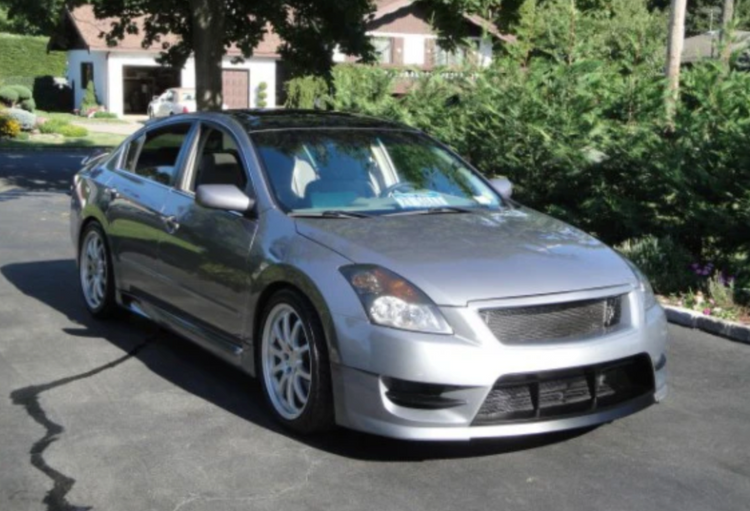 A side wide view of Stillen 4-Piece Body Kit for Nissan Altima 2007-2009 fitted on a car