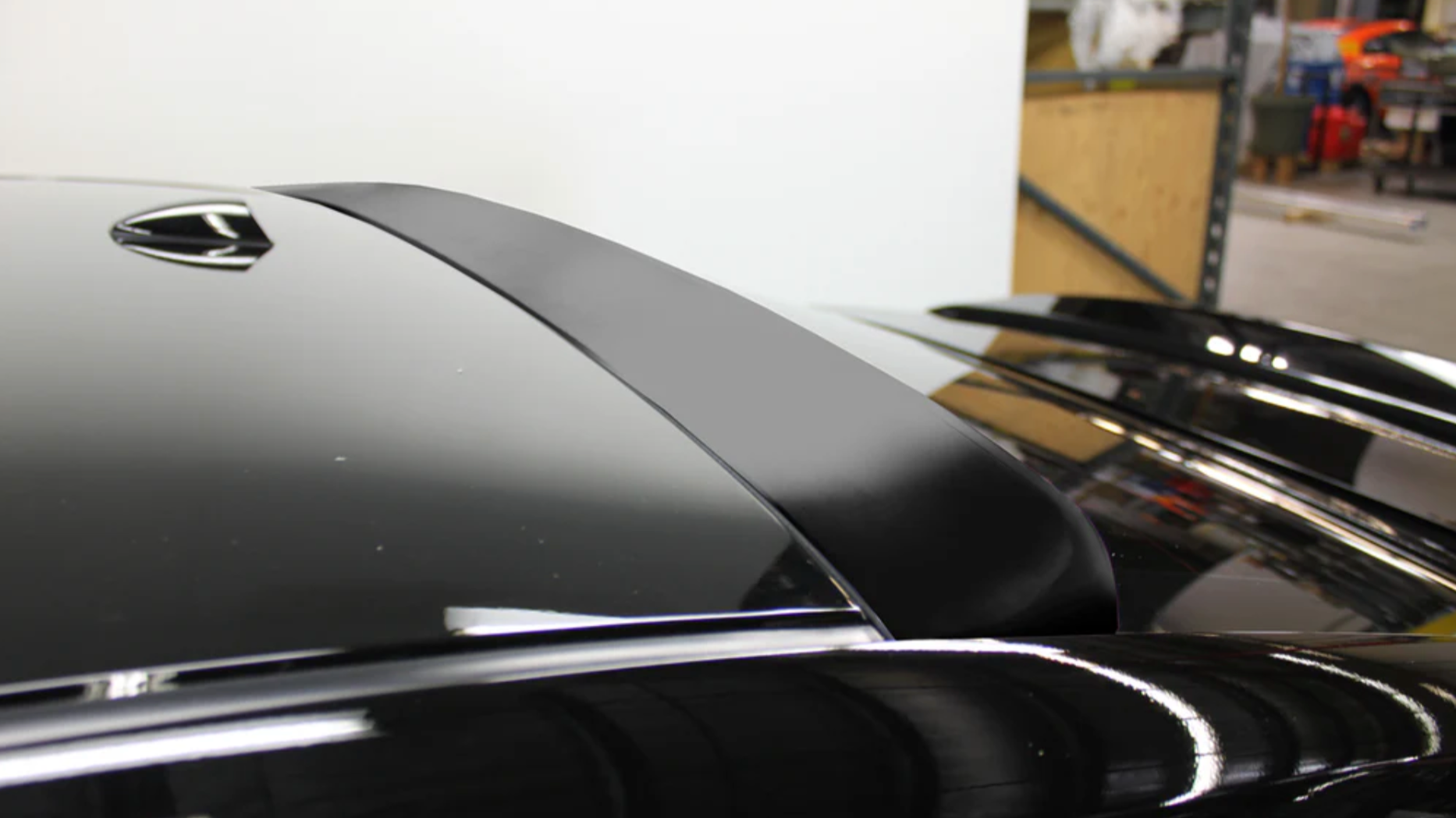 A top wide view of Stillen Roof Wing [UNPAINTED] for Nissan Maxima 2016-2018 fitted on a car