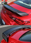 A back and top close up view of Stillen Rear Spoiler [Carbon Fiber] for Infiniti Q60 2017-2022 fitted on a car